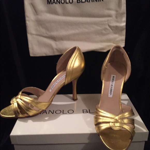 Manolo Blahnik Shoes - Manolo blahnik gold leather open top pumps .